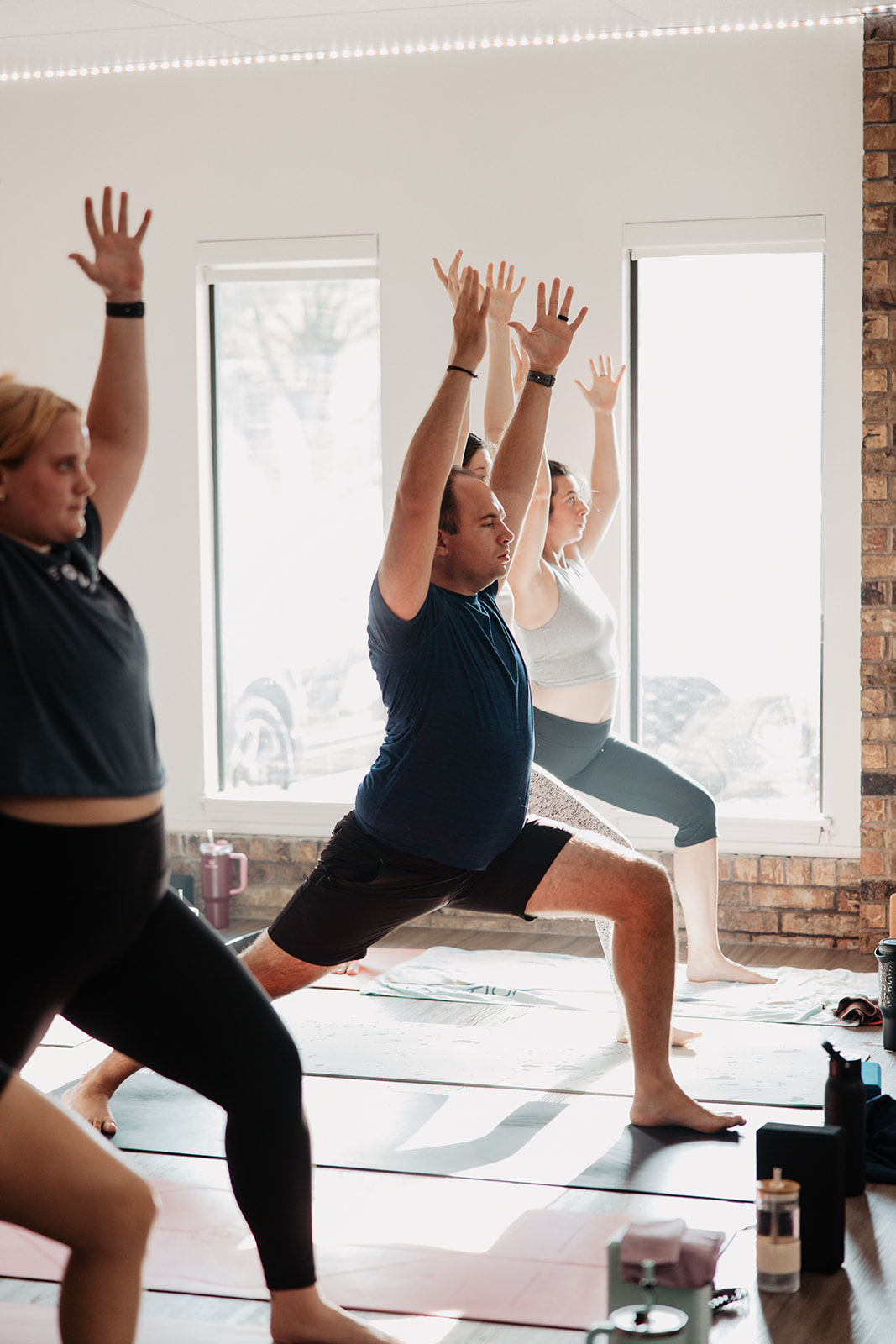Warrior 1 pose demonstration during yoga practice